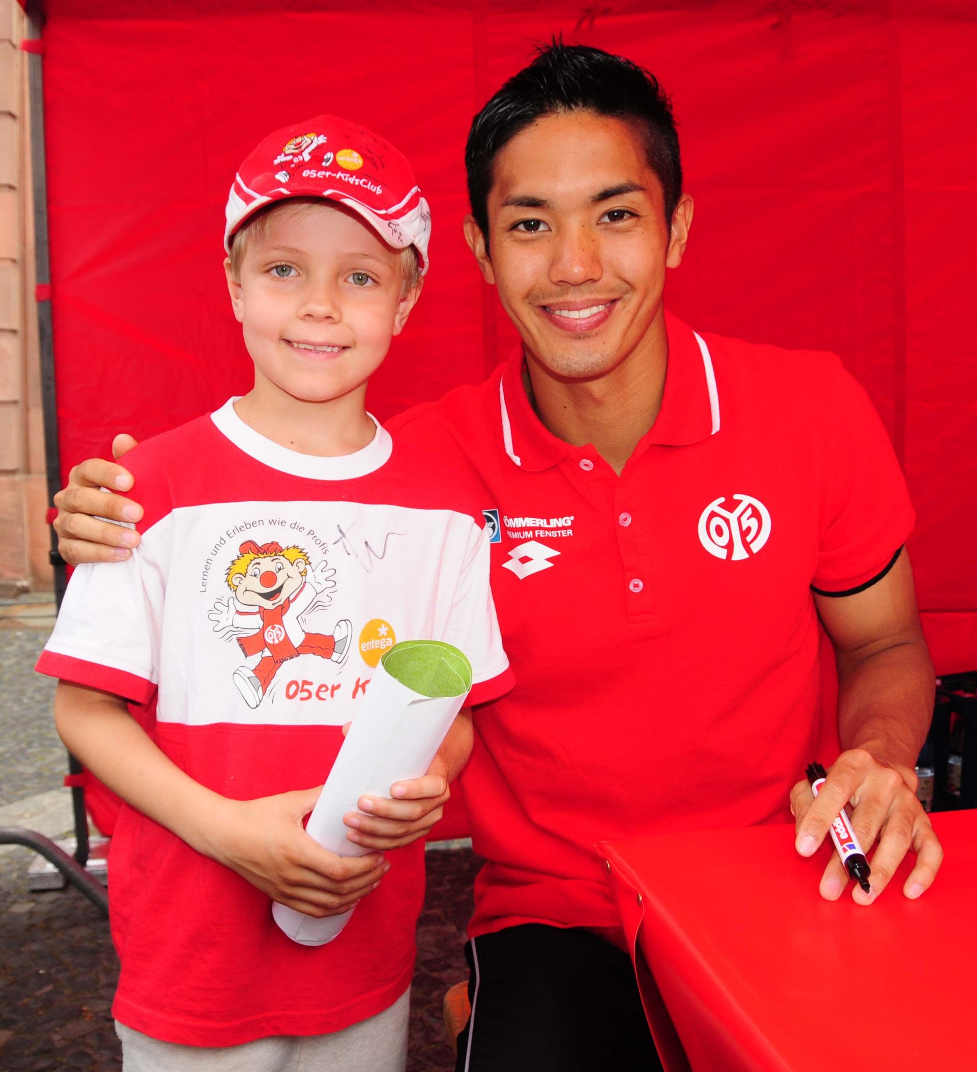 Yoshi Muto und sein Fan (namens Ben).