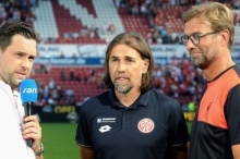 Der Hype um Jürgen Klopp (r.) schien auch Martin Schmidt (M.) zu erstaunen.