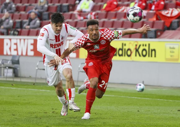 Mit dem 3:2 in Köln hatten sich die 05er (r. Karim Onisiwo) auf fünf Punkte von ihrem Gegner abgesetzt. In Bremen wollen sie das Polster auf die Abstiegsplätze vergrößern. 