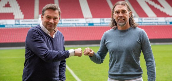 Basteln nach erfolgreichem Himmelfahrtskommando am Kader der nächsten Saison: Sportdirektor Martin Schmidt (r.) und Sportvorstand Christian Heidel.